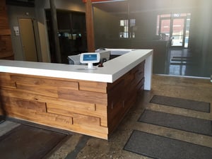 A visitor check-in app ensures guests are handled efficiently