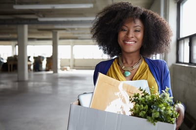 Lady office worker getting ready to move