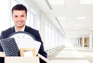 Employee with a packed box moving offices