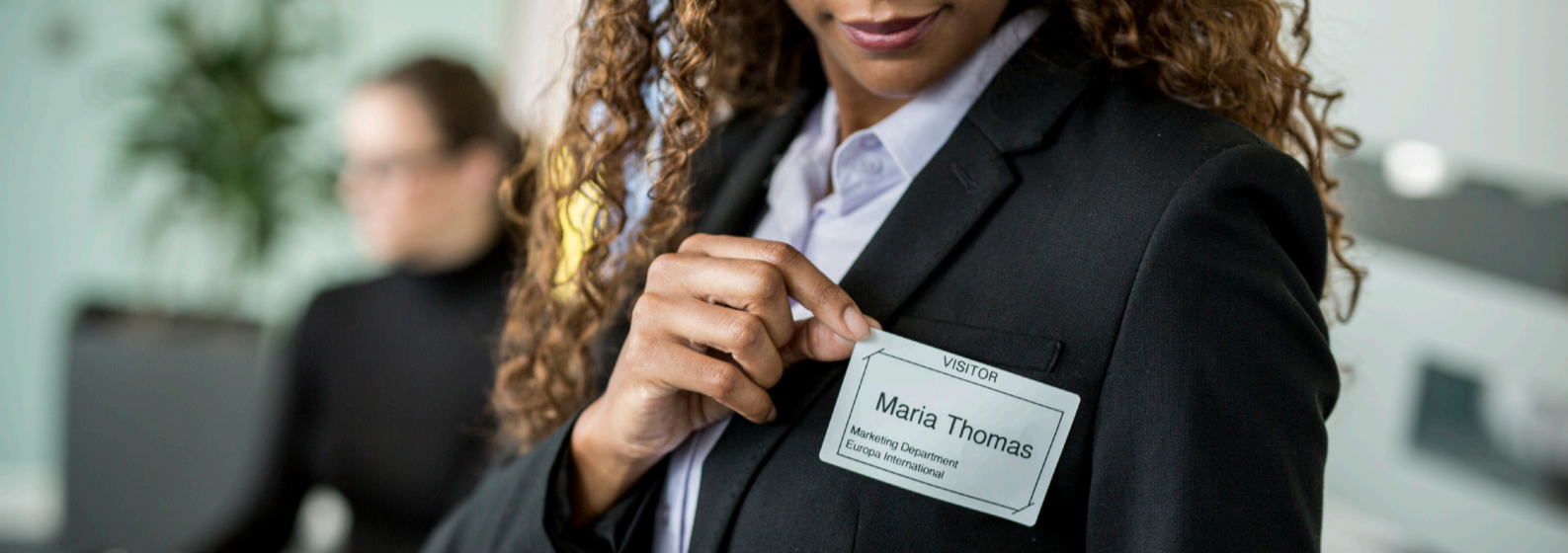 Check-in software prints visitor badges
