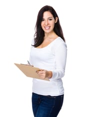 Smiling clerk with clipboard