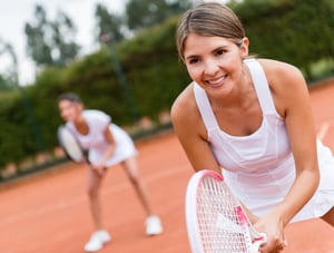 Woman practicing to get better at tennis