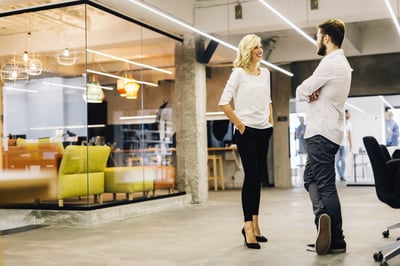 Coworking space community manager demonstrating her visitor management solution