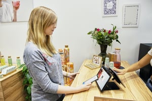 Shopper using a customer check-in system