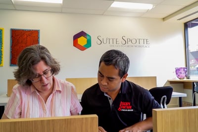 Recruiters greeting candidates with visitor management software