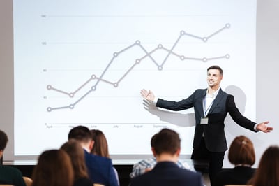 Businessman reviewing visitor management data