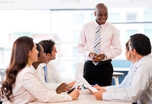 Office manager leading a meeting