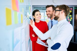 Employees working together in a modern conference room