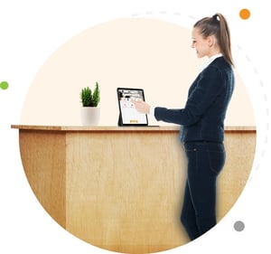 Woman using coworking space visitor management software