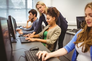 Employees at a tech company with a modern office 