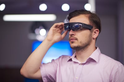 Employee using high tech augmented reality glasses