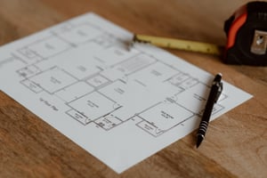 Architects finalizing an office floor plan