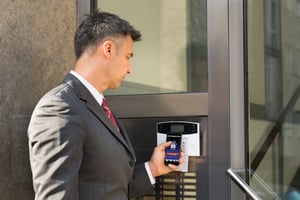 Office guest using visitor management system with access control integration