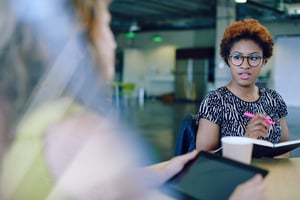 Annoyed employee who sits near the door