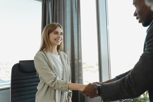 Recruiter using visitor management to greet an interview candidate