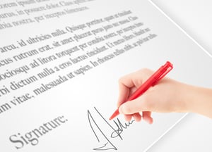 Using a digital pen to sign a legal document on a customer sign in app