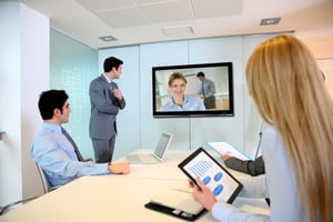 Hybrid office meeting with visitor management software