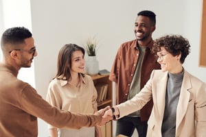 Shaking hands after using a customer check-in system