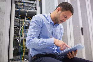 Data center employee using visitor management system data