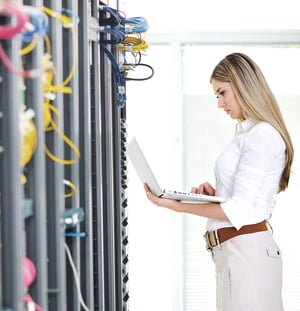 Engineer maintaining visitor management software servers