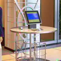 Guest approaching an office visitor management system kiosk