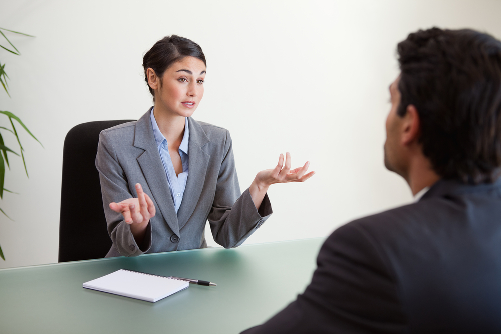 Businesswoman using a visitor sign in app