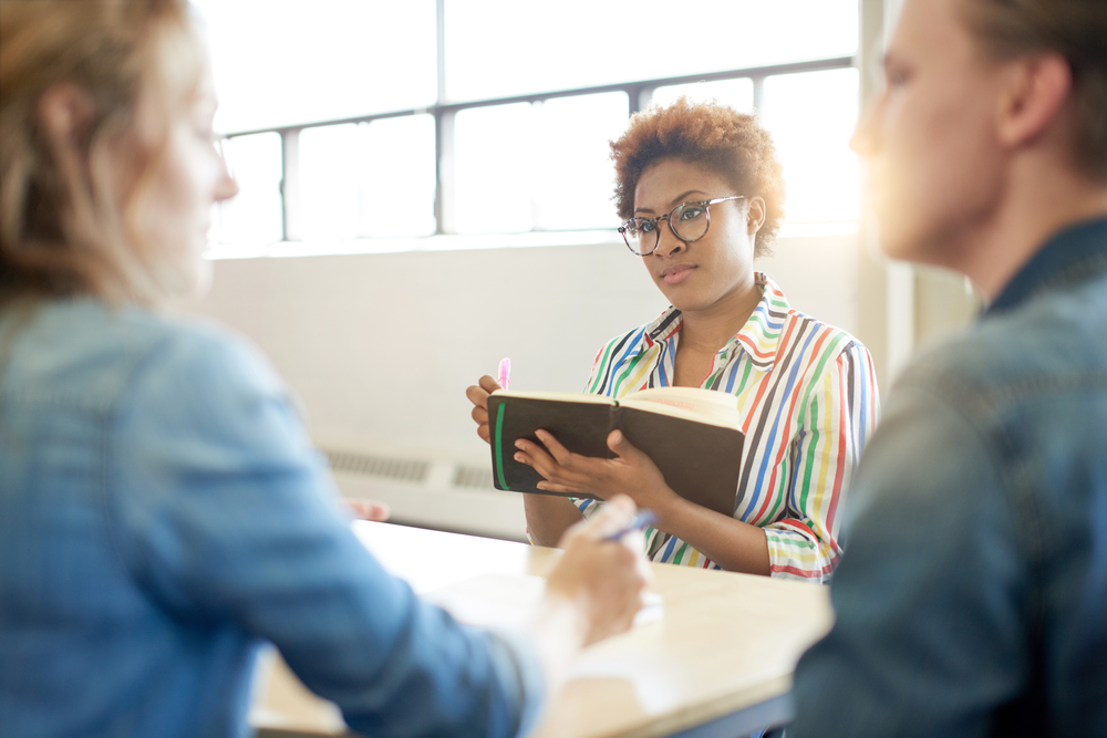 Working together in a shared workspace with natural light