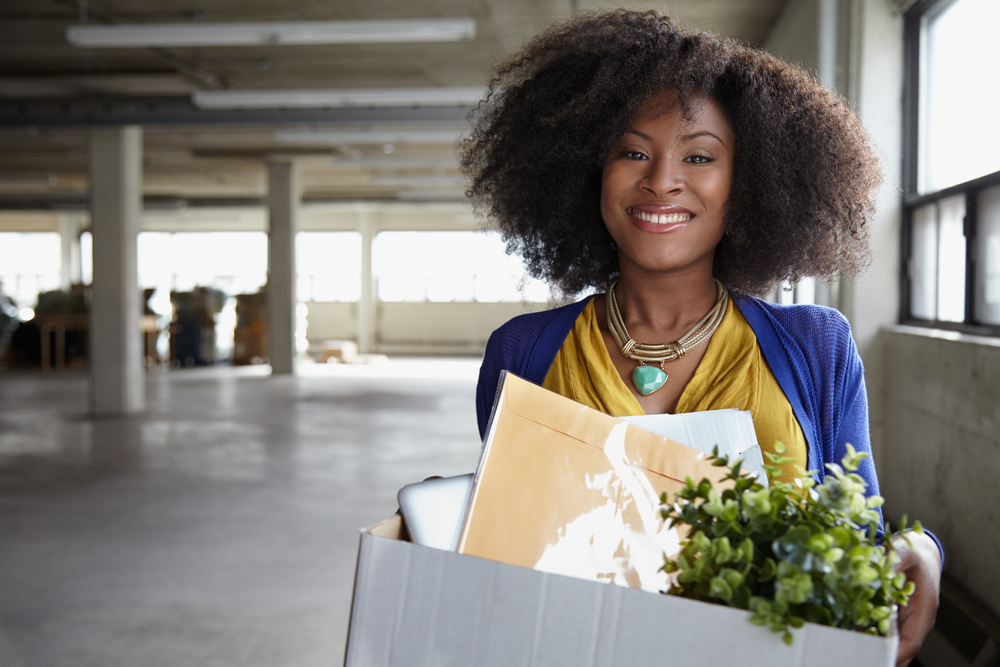 Lady office worker getting ready to move