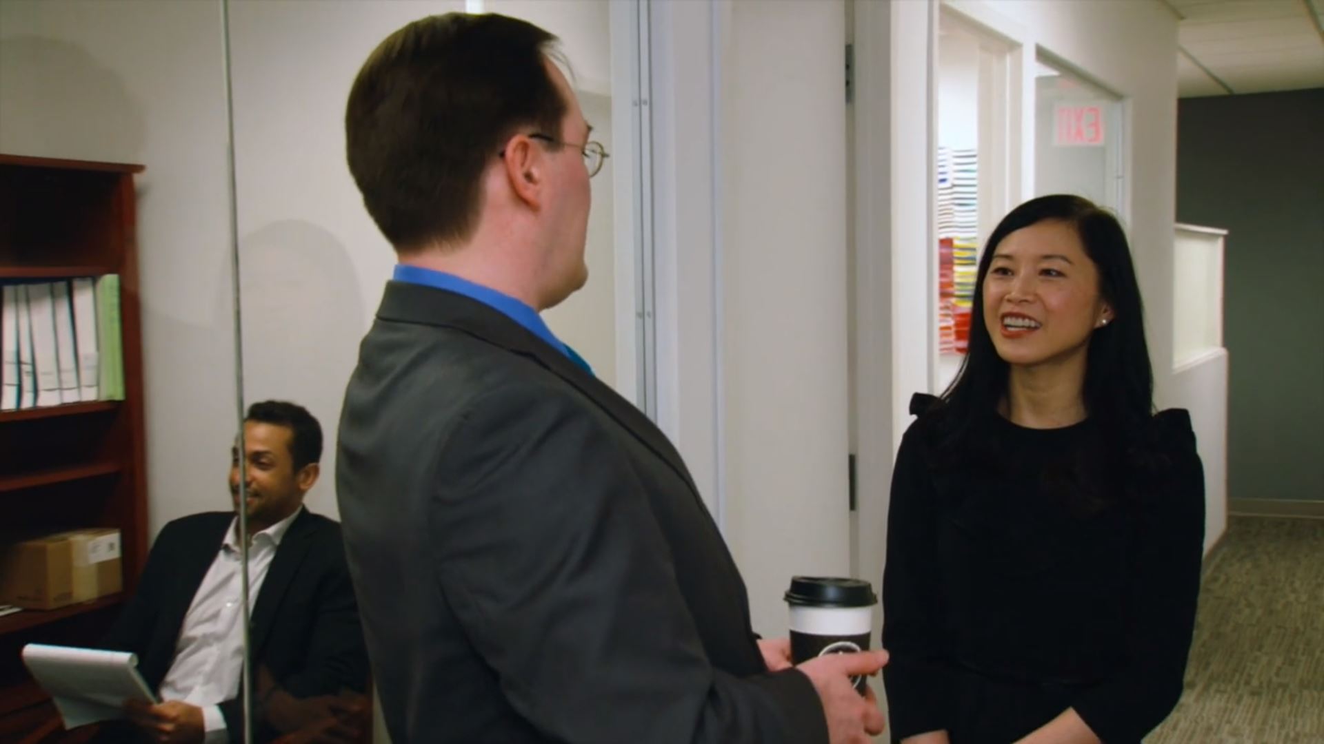 Lawyers meeting in their shared workspace environment