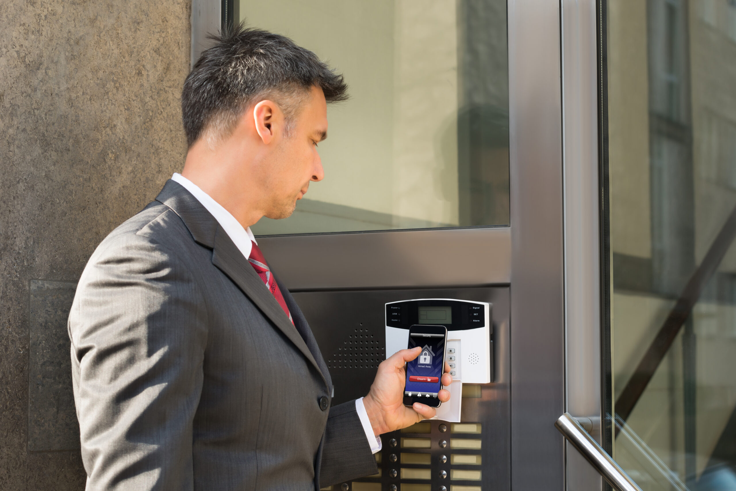 Office guest using visitor management system with access control integration