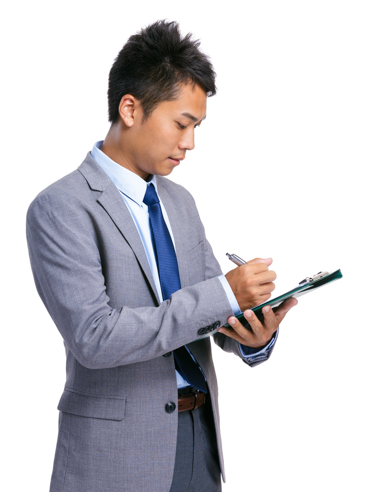 Businessman reviewing visitor management log data
